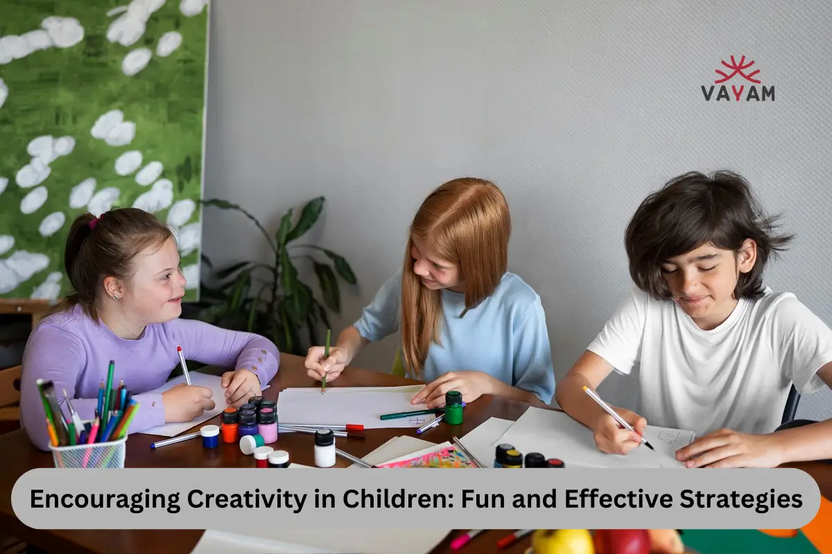 Three young artists focused on their drawings at a table, highlighting the importance of creativity in childhood.