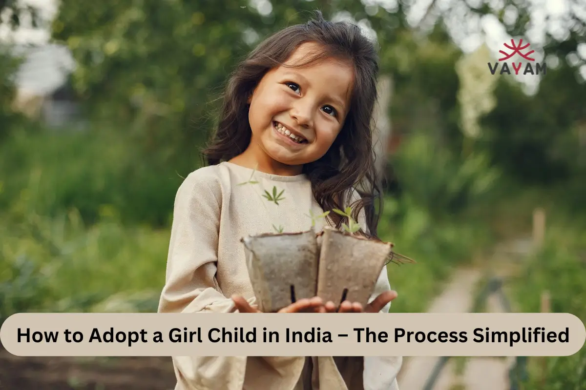 A young girl joyfully holds two pots of plants, symbolizing hope and growth in the context of adopt a girl child in India.