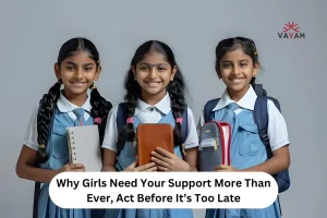 Three school-uniformed girls hold books, representing the need for support in their educational journey and empowerment.