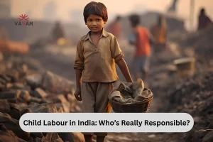 A young boy carrying a basket of rocks, highlighting the issue of child labor in India and its societal implications.