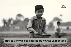 A boy stands in a field holding a basket, symbolizing child labor-free business practices.