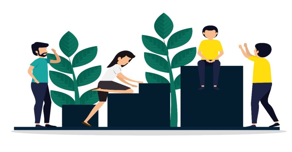 People sitting on a block with plants, while a man stands, illustrating a CSR strategy discussion.