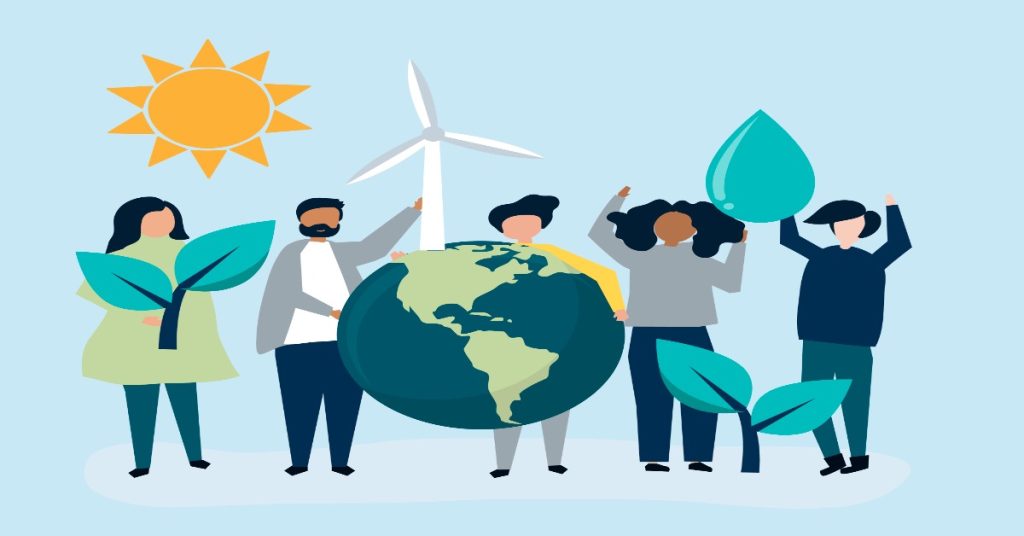 A diverse group of individuals lifting a globe adorned with wind turbines and trees, highlighting environmental initiatives.