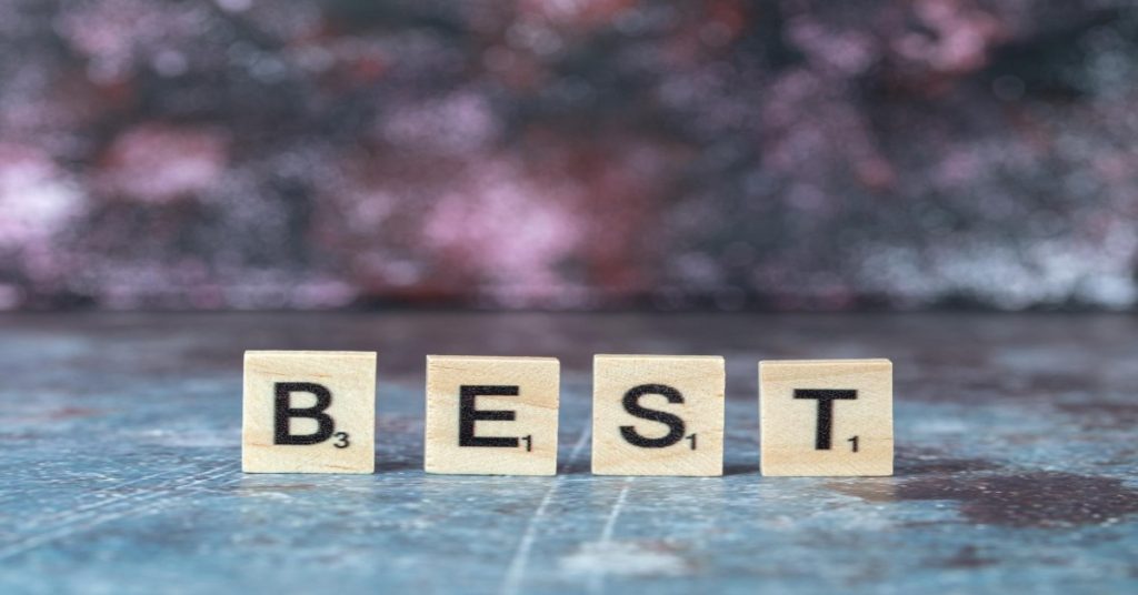 The word "best" displayed on wooden blocks, emphasizing best practices from successful MGNREGA surveys.
