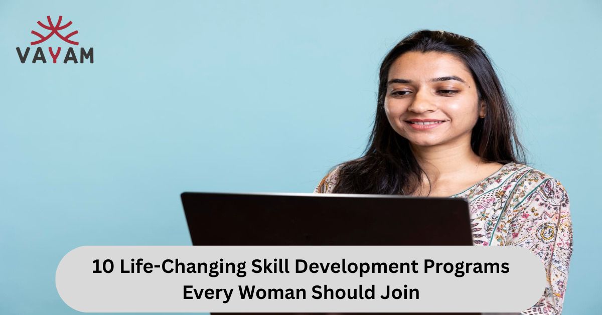 A woman, sitting with a laptop indulged in skill development programs for women.