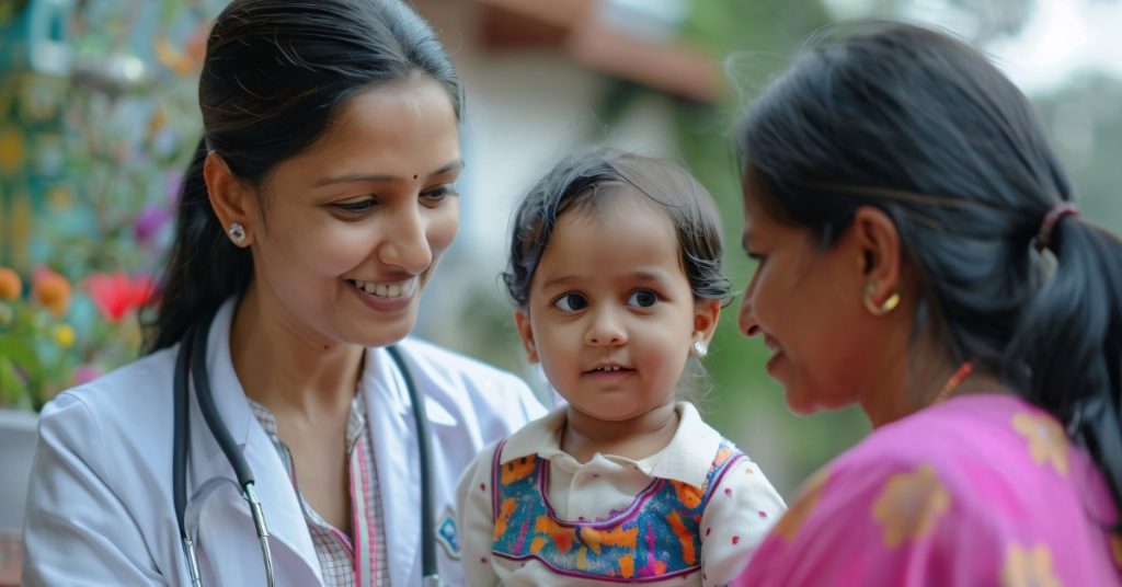 A doctor talks to a woman with a baby, emphasizing the importance of safety and health of girls.