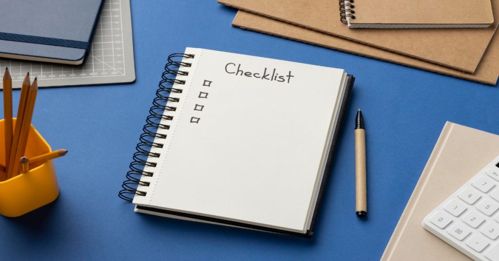Checklist on a notepad, emphasizing the evaluation of facilities using a standardized approach.