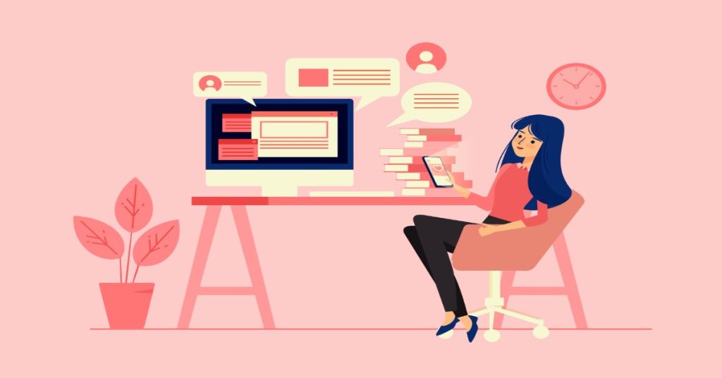 A woman seated at a desk with a laptop and phone, developing her online skill for creative social media management.