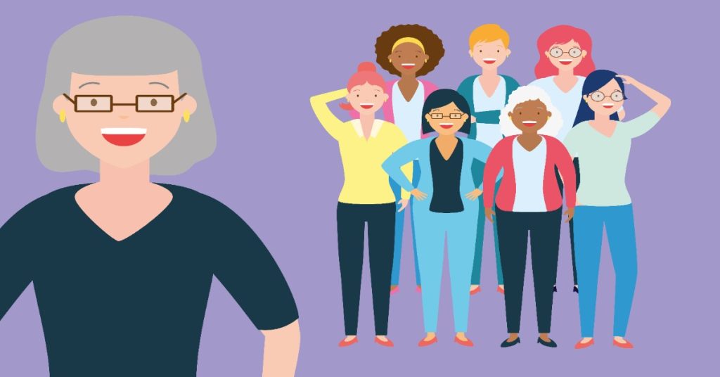 A woman with glasses and her peers represent the evolving career paths of women over 40 in today's workforce.